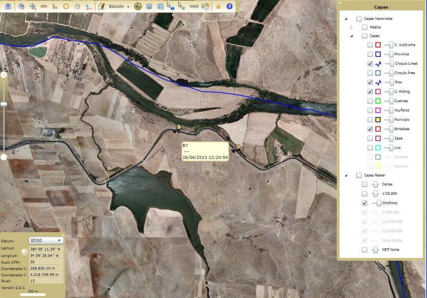 Pantalla de ordenador mostrando una fotografía aérea e información de geocampo