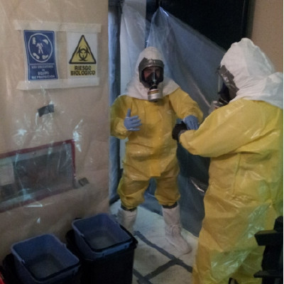 Experts disinfecting the house.