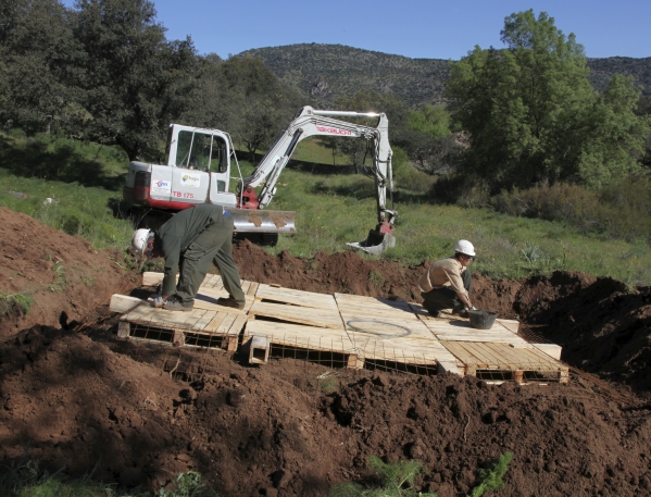 Workers digging in the mountains