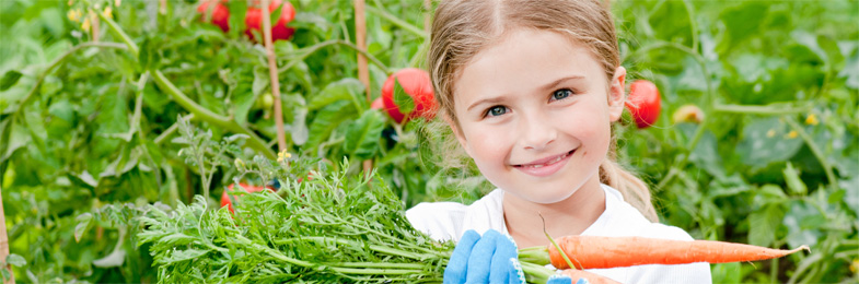 Niña con vegetales